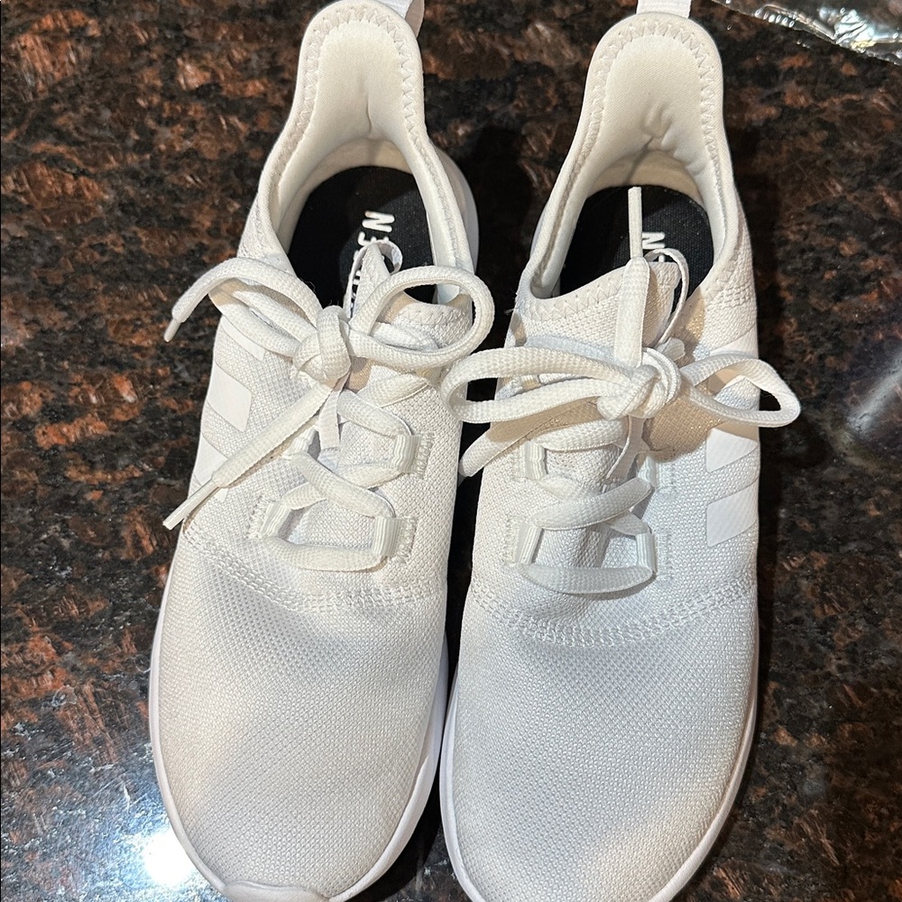 adidas women’s white Athletic Shoes.  Worn one time.